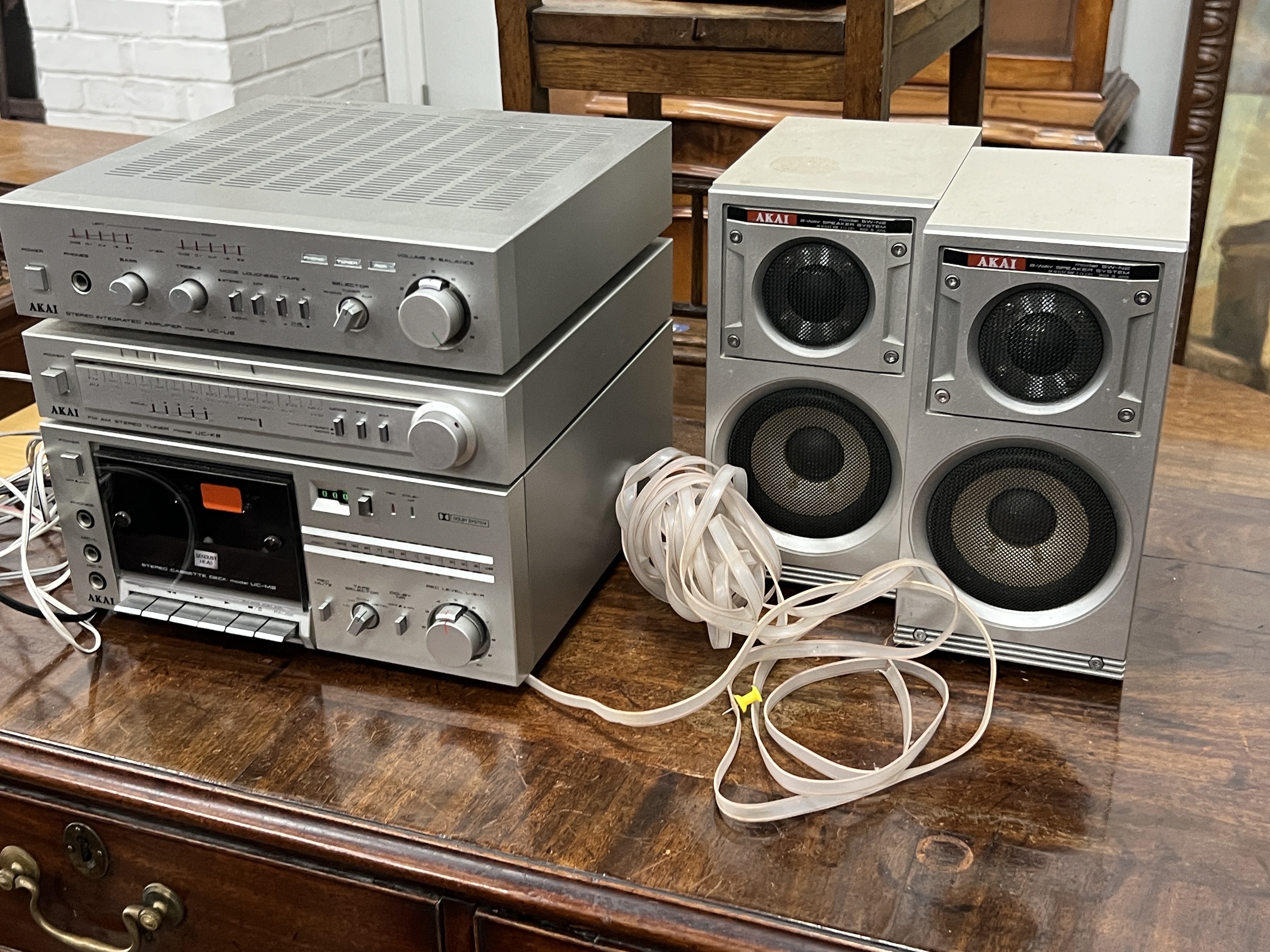A pair of 'Aegis Two' loudspeakers, height 84cm and an Akai UC series Amplifier, Tuner, Cassette Deck and Speakers.